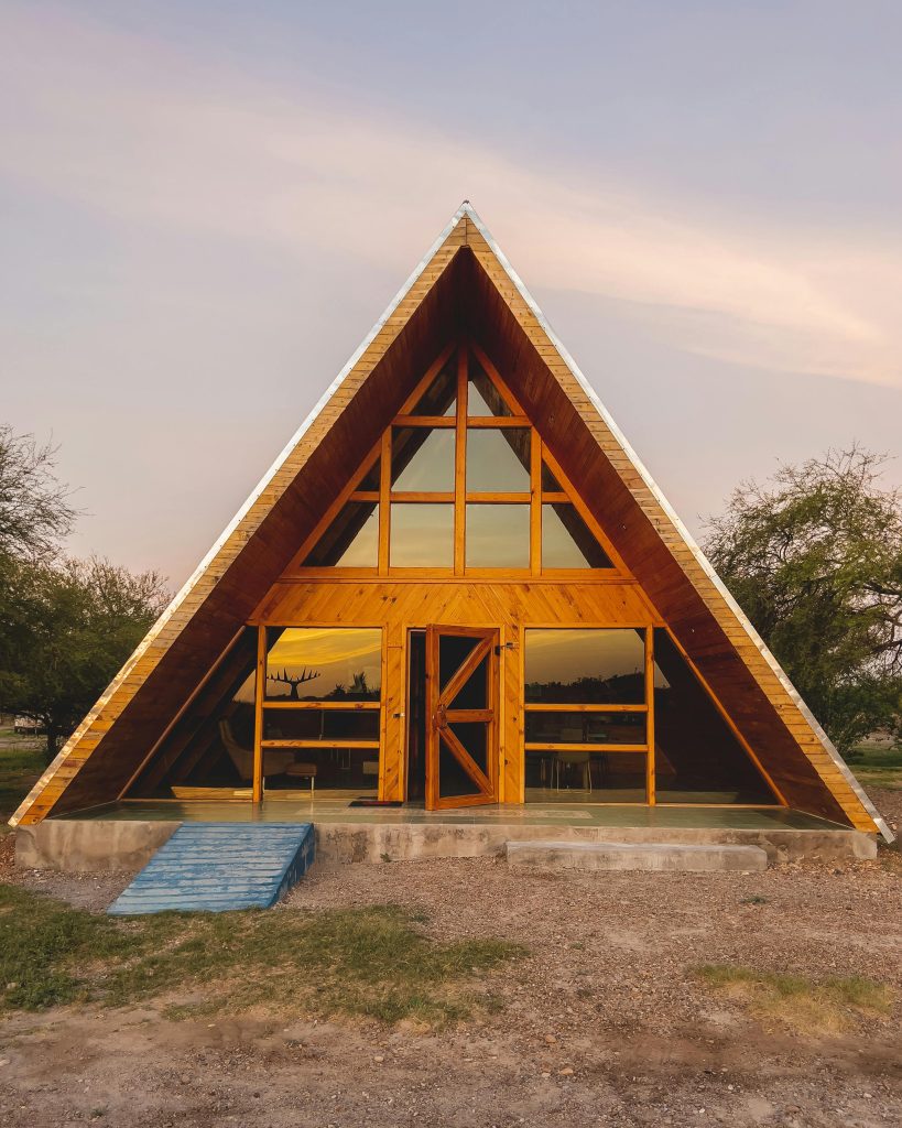 A Wooden Cabana with Glass Wall